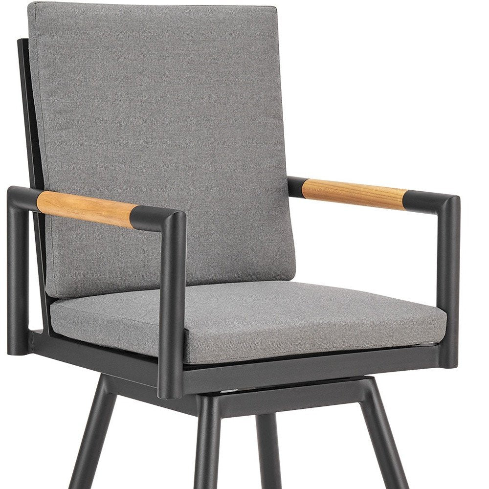 48" Dark Gray Metal Swivel Outdoor Bar Height chair with Footrest. Outdoor bar chair isolated on a plain white background, finished in charcoal metal.