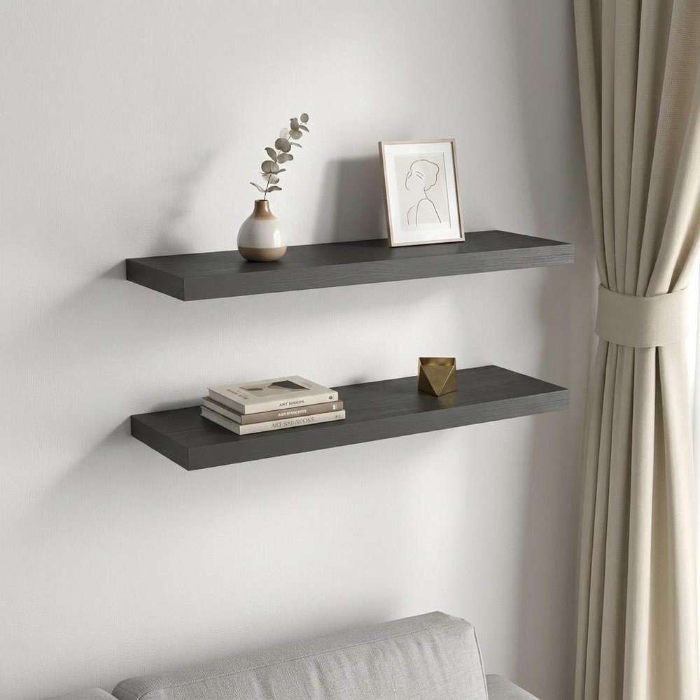 32" Set Of Two Dark Gray Wood Wall Mounted Floating Shelves styled in a furnished interior with an off-white wall on a off-white floor in charcoal wood.