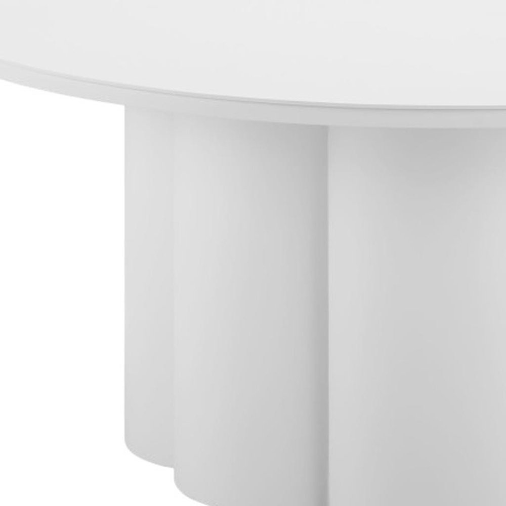 Close-up of a white rounded aluminum outdoor coffee table with a fluted base against a white background.