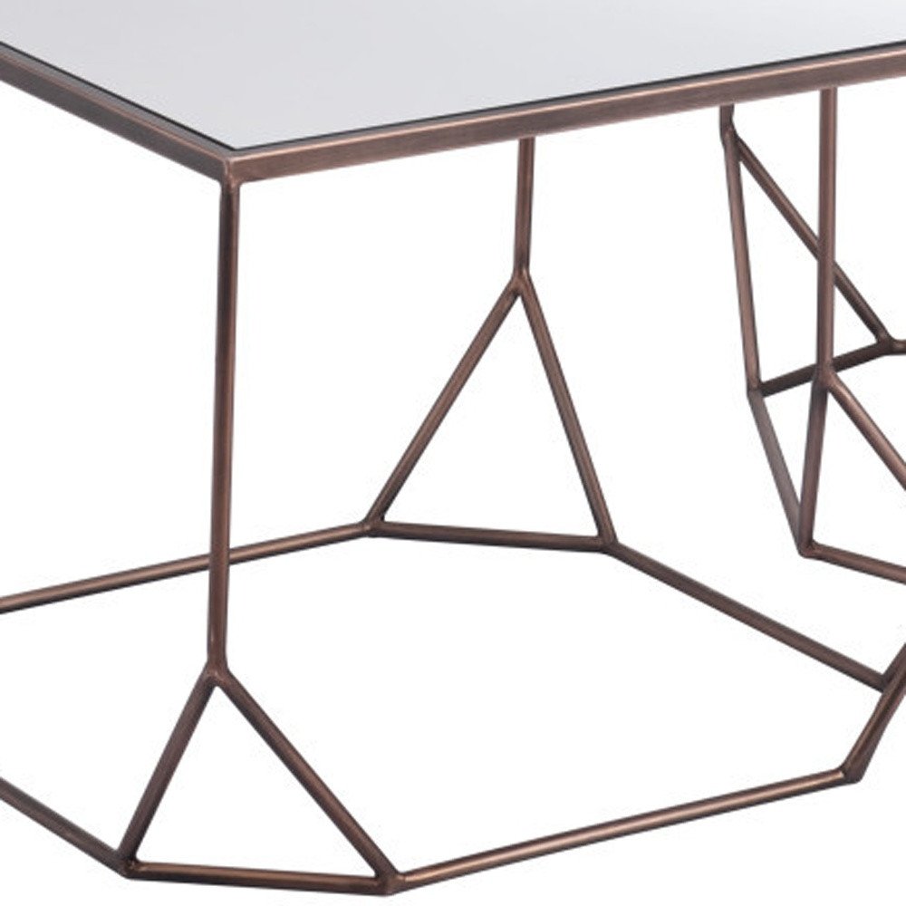 Bronze geometric steel frame coffee table with a mirrored glass top on a white background.