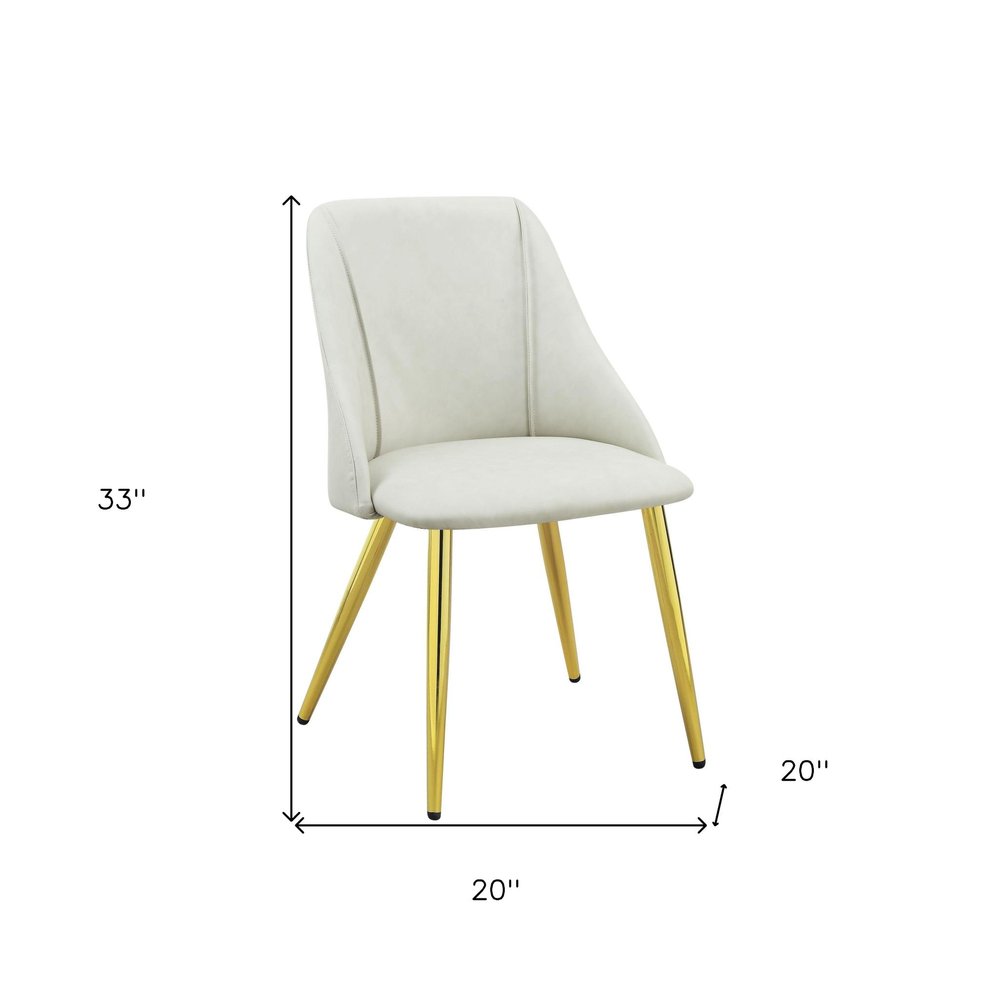 Set of Two White and Gold Upholstered Faux Leather And Metal Dining Side Chairs on a white background