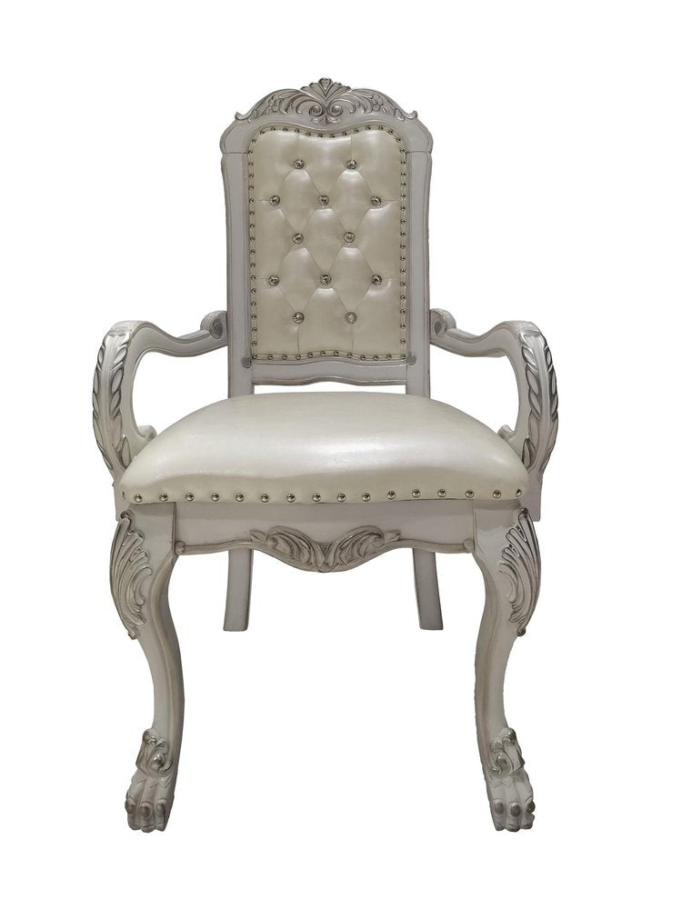 Set of Two Tufted White Upholstered Faux Leather And Wood Dining Arm Chairs on a white background