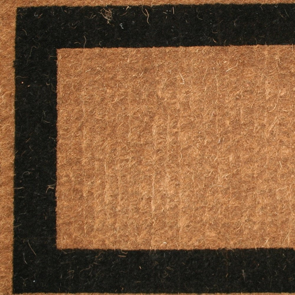 36" X 60" Brown and Black Coir Outdoor Door Mat close-up highlighting the black surface.