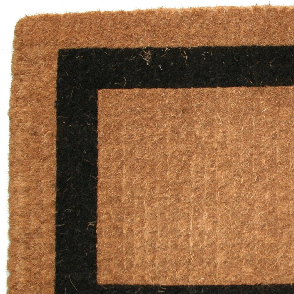 Close-up of 36" X 60" Brown and Black Coir Outdoor Door Mat showing the black texture.