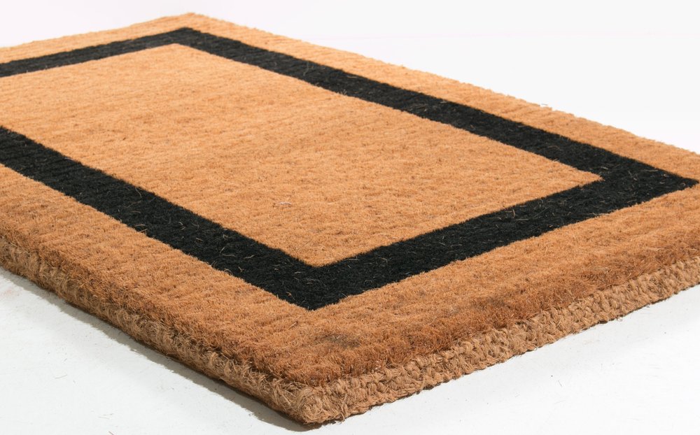 36" X 60" Brown and Black Coir Outdoor Door Mat. Doormat isolated on a plain white background, finished in brown.