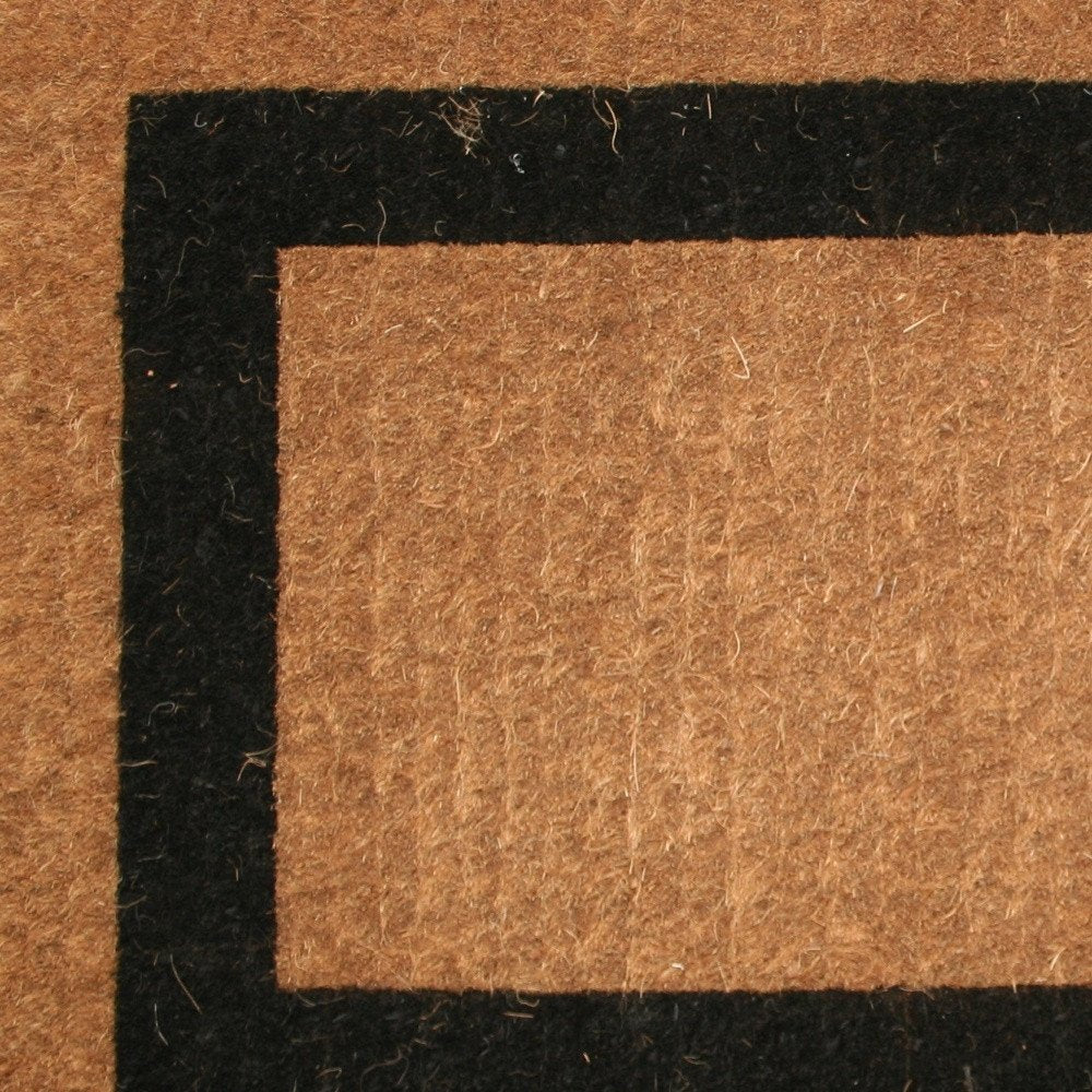36" X 60" Brown and Black Coir Outdoor Door Mat photographed against a dark studio background in black.