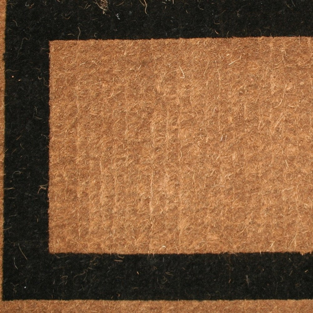 Detail view of 36" X 60" Brown and Black Coir Outdoor Door Mat, filling the frame with the black texture.