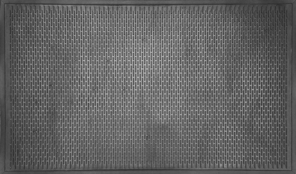 Detail view of 36" X 59" Black Rubber Outdoor Door Mat, filling the frame with the black texture.