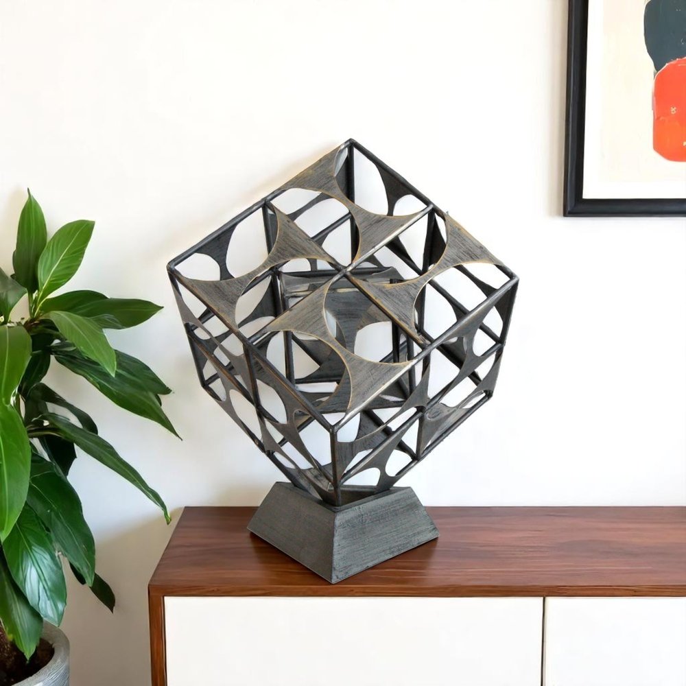 20" Gray Metal Geo Cube Tabletop Sculpture. Sculpture isolated on a plain white background, showing a gray metal surface.
