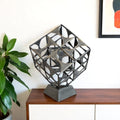 20" Gray Metal Geo Cube Tabletop Sculpture. Sculpture isolated on a plain white background, showing a gray metal surface.