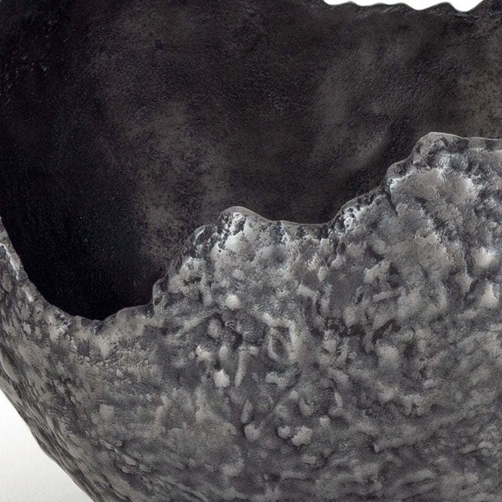 Set of Two Gray And Silver Aluminum Decorative Bowls in a home interior