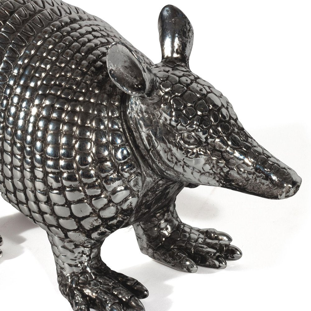 18" Silver Resin Armadillo Figurine. Home product isolated on a plain white background, finished in silver resin.