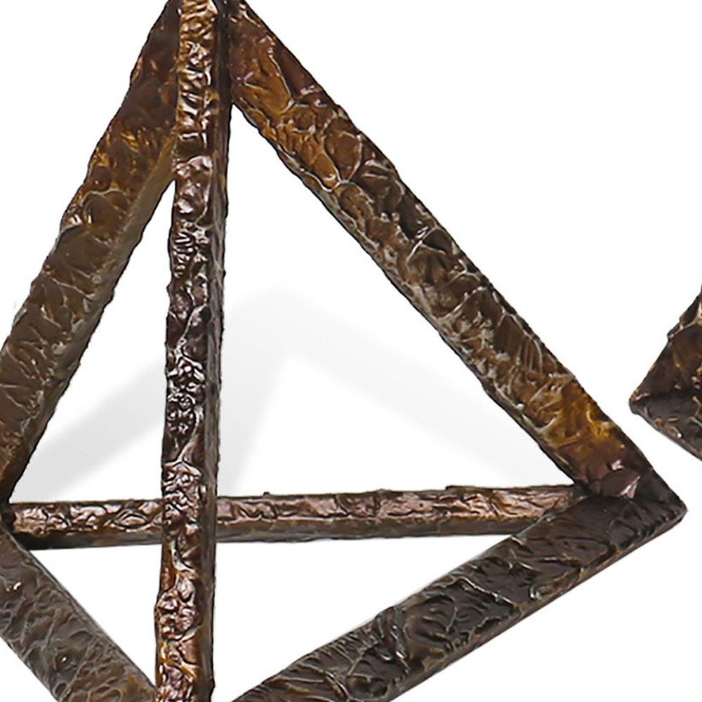 Set of Three Bronze Metal Pyramid Tabletop Sculptures on a white background
