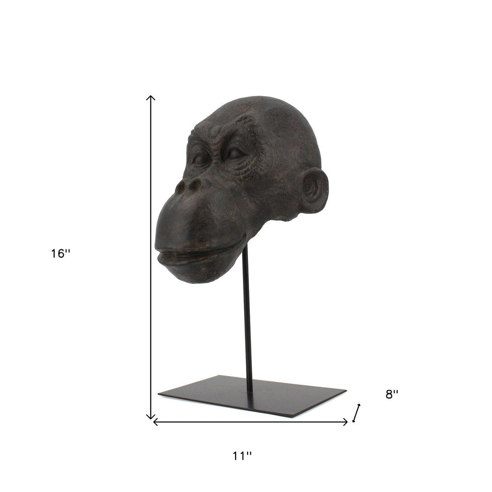 16" Brown Resin Gorilla Face Tabletop Sculpture. Sculpture isolated on a plain white background, showing a resin surface.