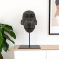 16" Brown Resin Gorilla Face Tabletop Sculpture. Sculpture isolated on a plain white background, showing a resin surface.