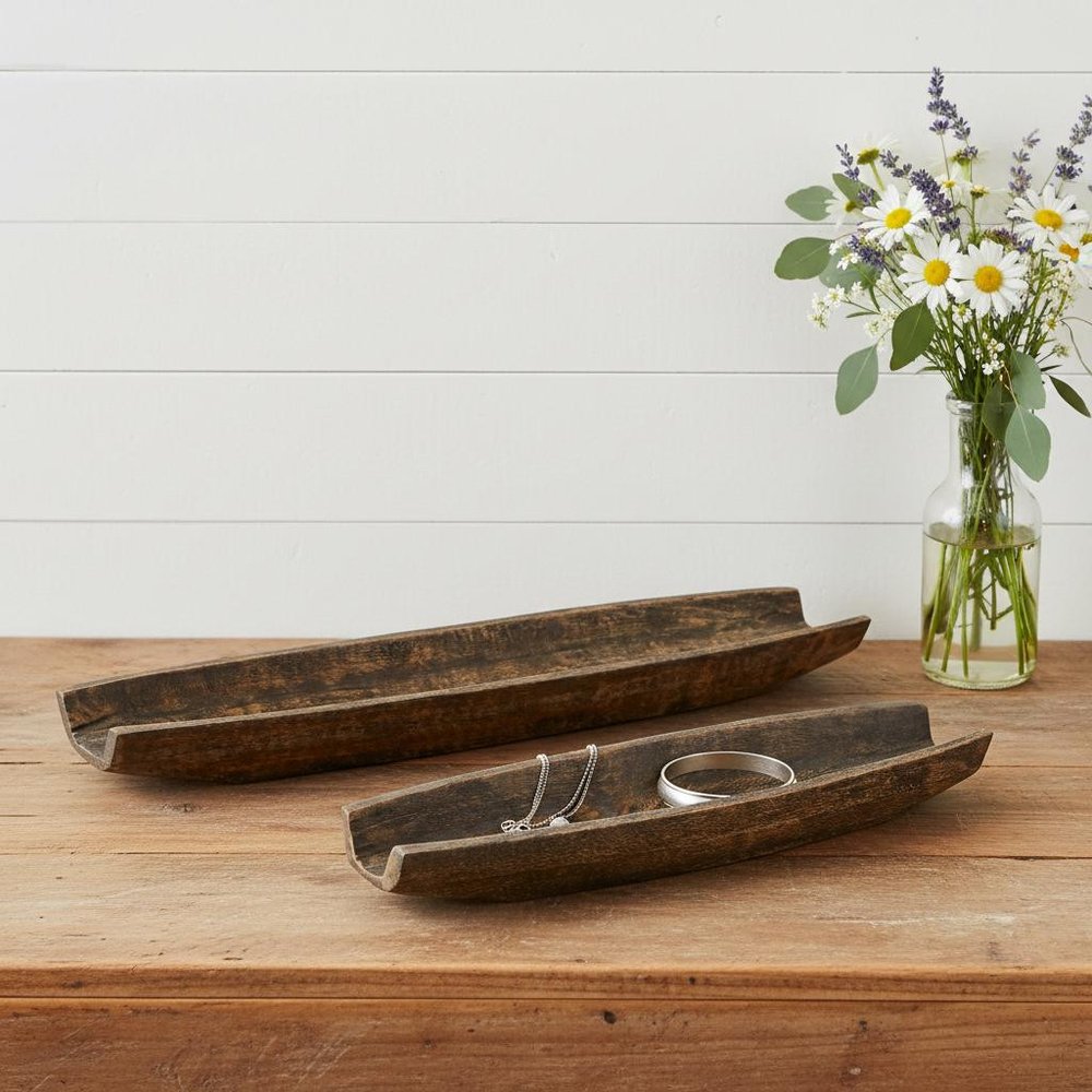 Set of Two Dark Brown Solid Wood Boat Vanity Trays in a home interior