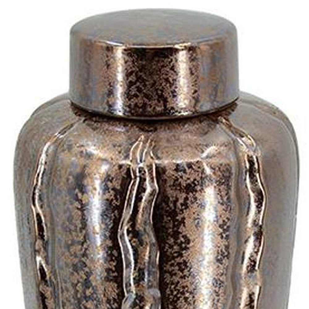Set of Three Bronze And Silver Ceramic Urn Ginger Jars on a white background