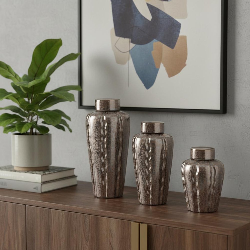 Set of Three Bronze And Silver Ceramic Urn Ginger Jars in a home interior