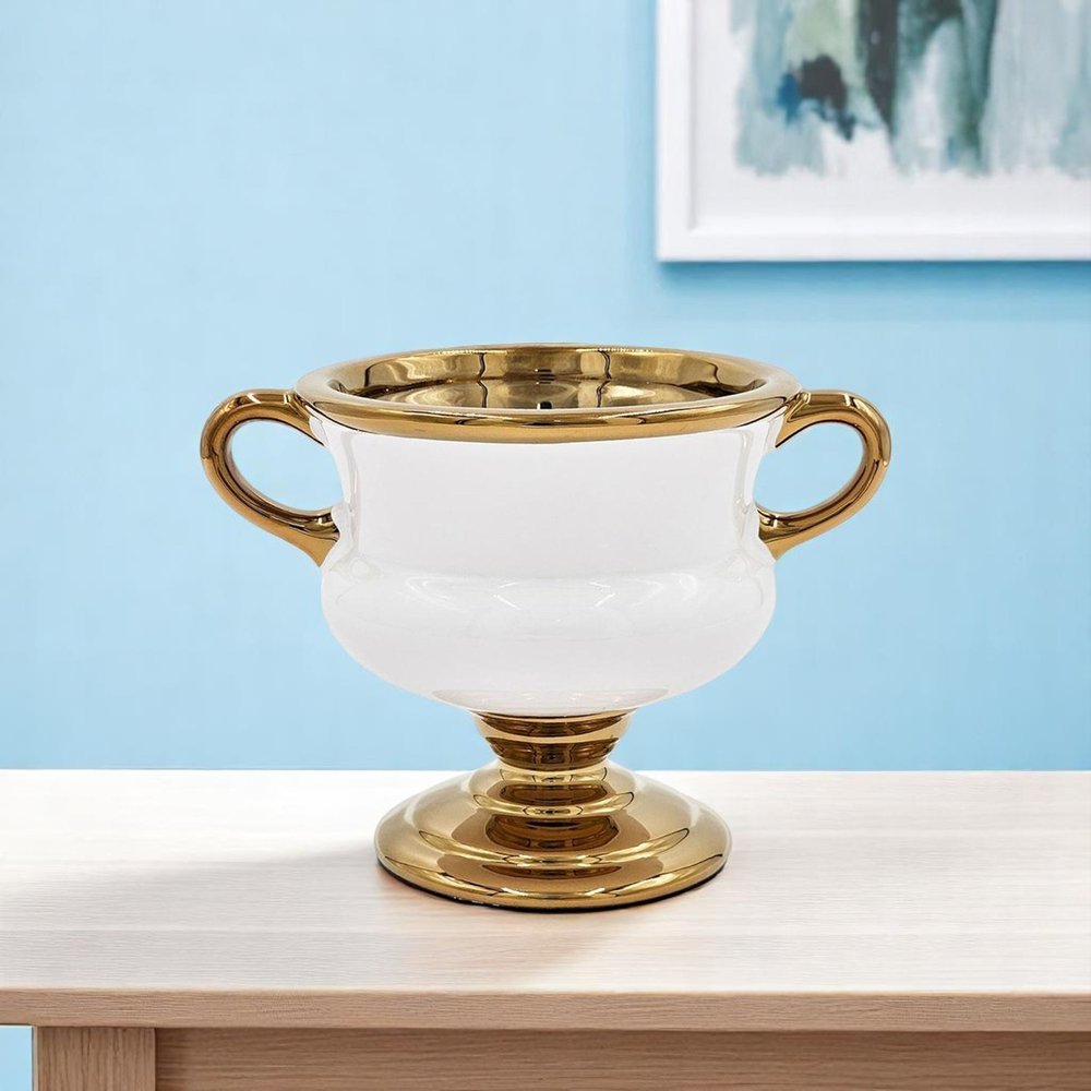 6" White And Gold Amphora Ceramic Table Vase shown outdoors on an outdoor setting.