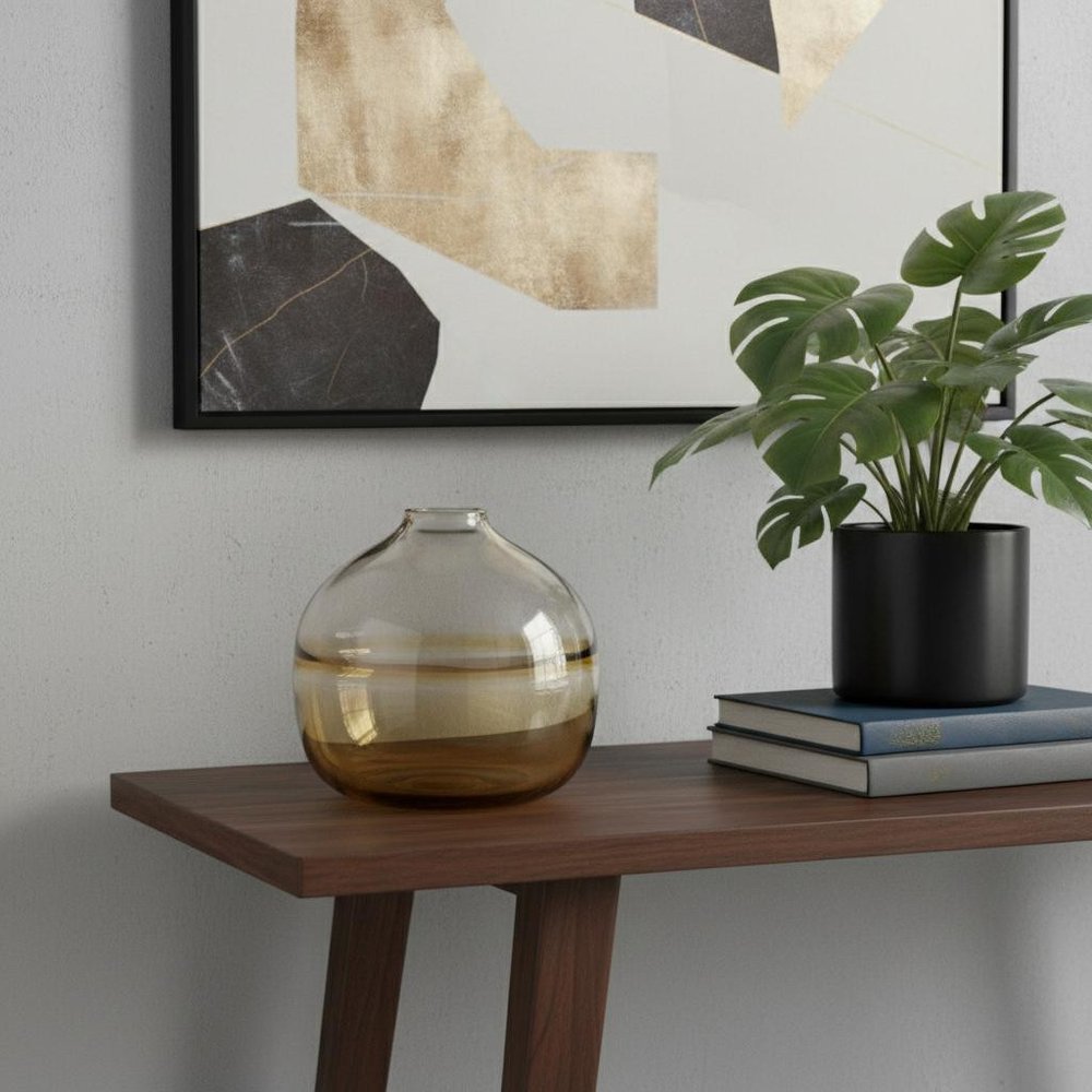 9" Clear And Brown Ombre Glass Round Table Vase in a home interior