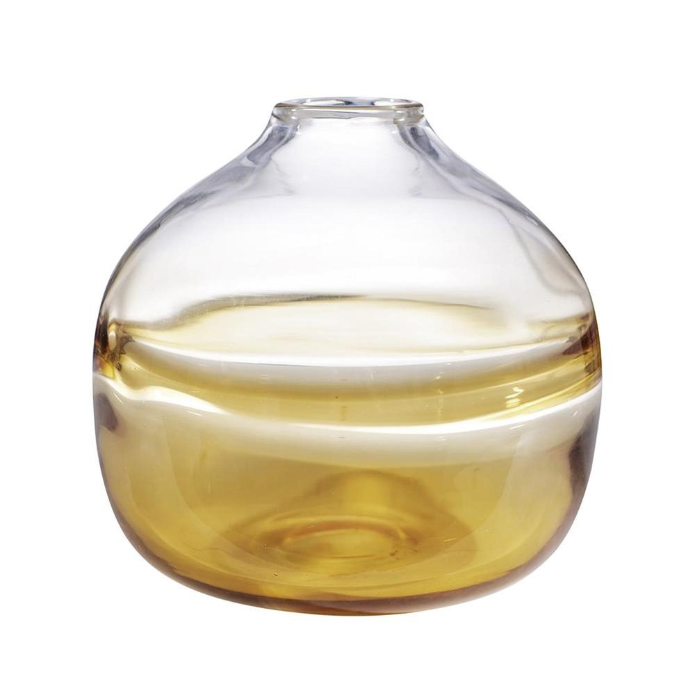 Clear and brown ombre glass round table vase on a white background.