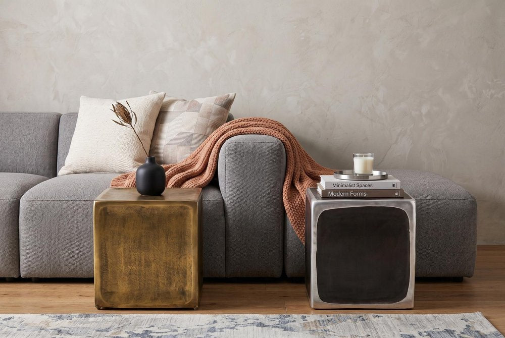 Set of Two Black Silver And Antiqued Brass Aluminum Square Block End Tables in a home interior