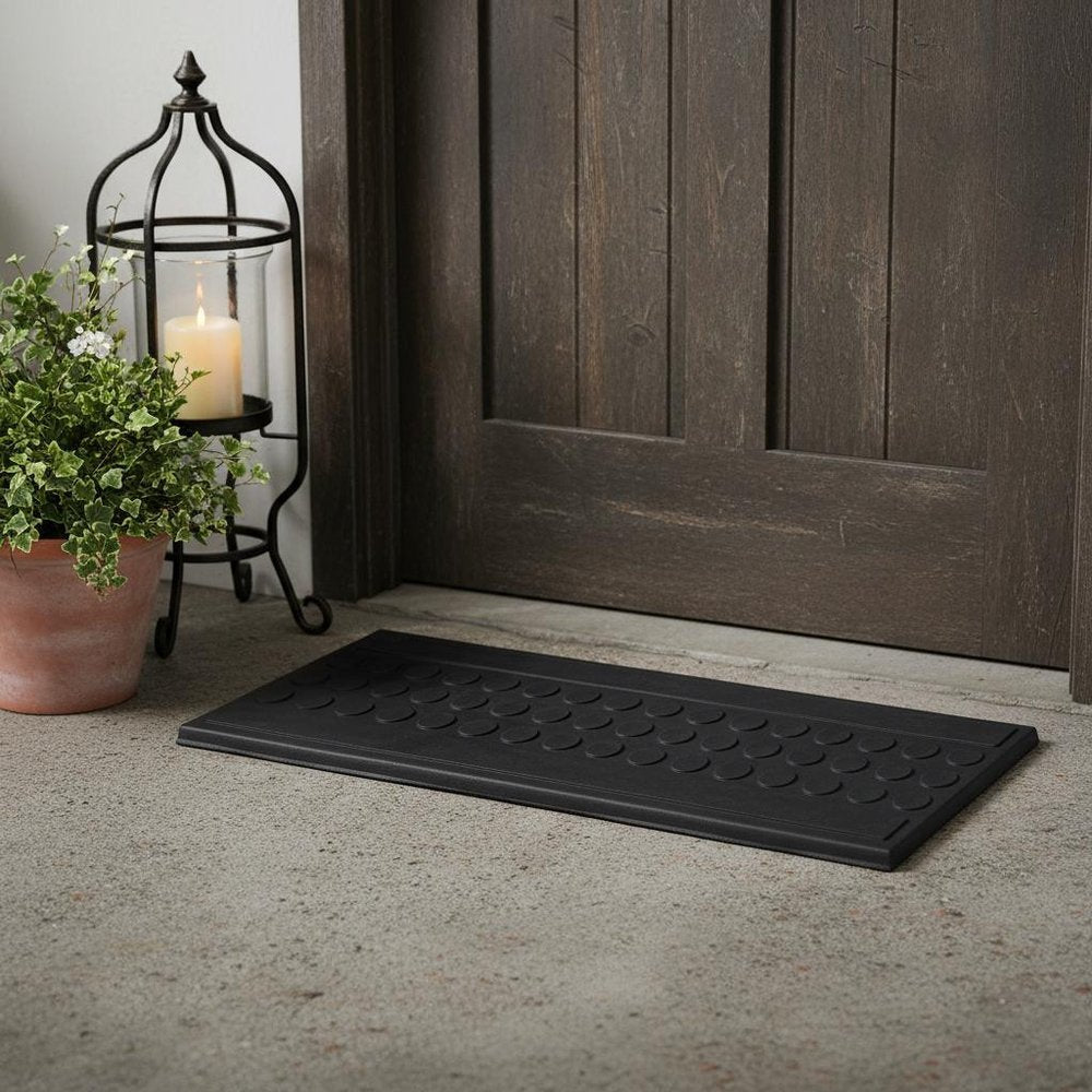 9" X 30" Black Rubber Outdoor Door Mat in a home interior