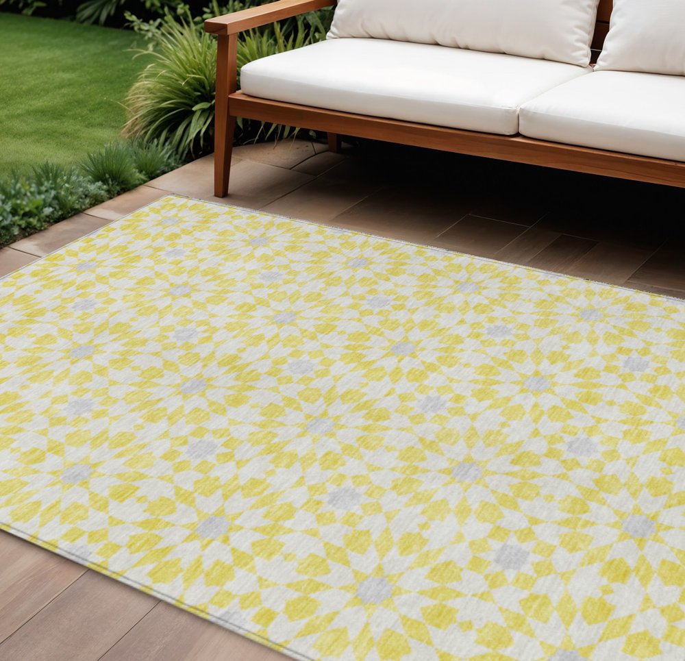 9' X 12' Yellow Ivory And Gray Floral Medallion Washable Indoor Outdoor Area Rug in a home interior