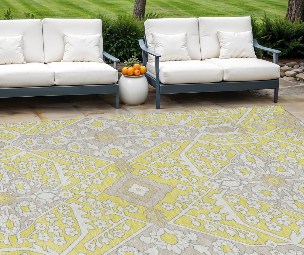 9' X 12' Yellow Ivory And Beige Floral Washable Indoor Outdoor Area Rug in a home interior