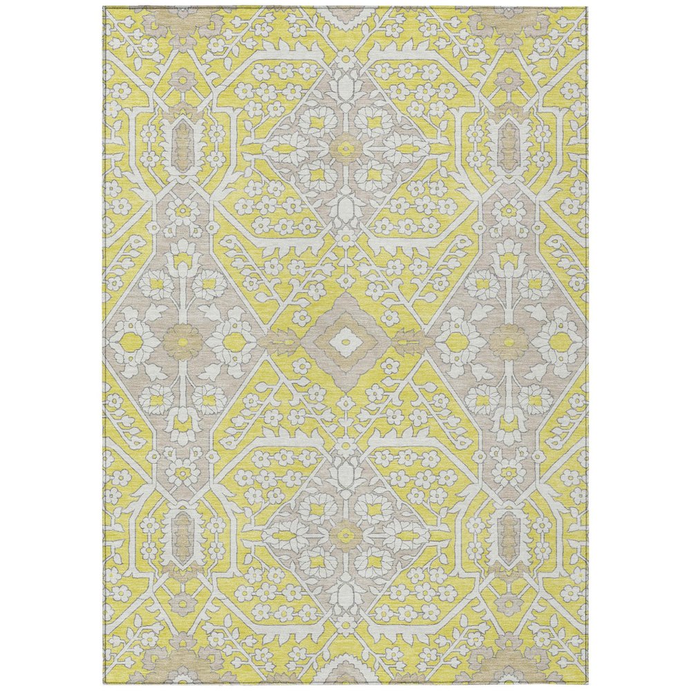 Yellow, ivory, and beige floral patterned indoor/outdoor area rug.