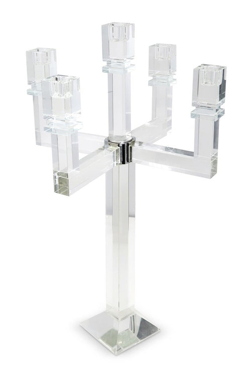 Clear faceted crystal candelabra with a square base on a white background.