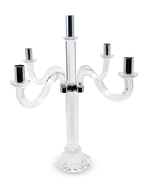 Clear crystal candelabra with silver candle cups on a white background.