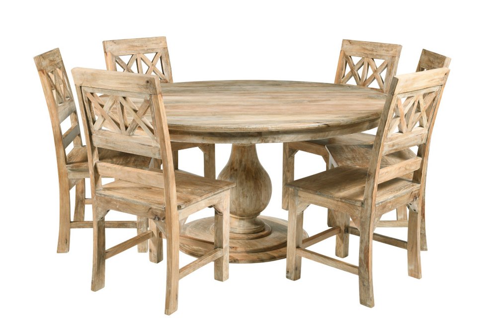 Seven piece natural solid wood round dining set with six chairs on a white background.