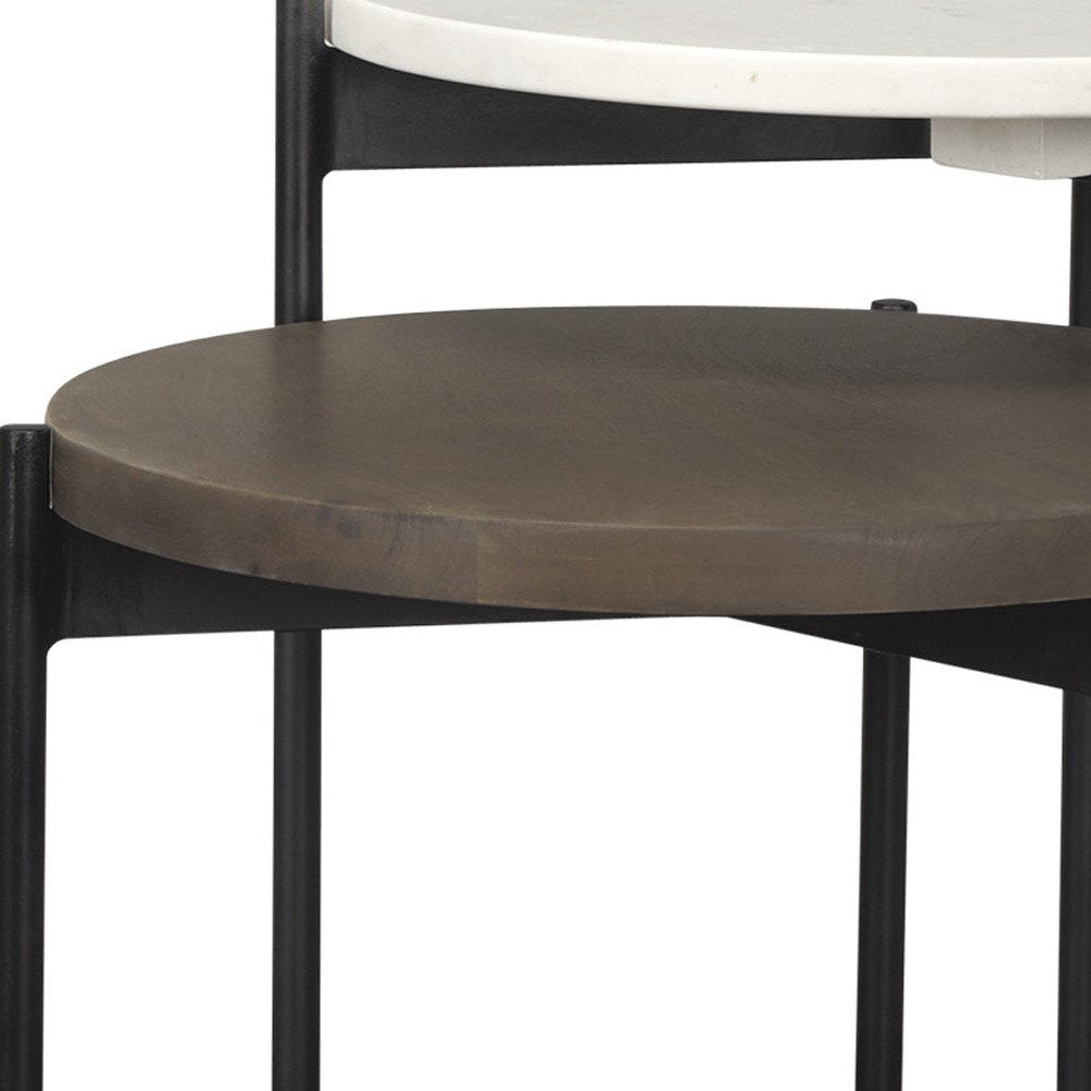 Set of Two Dark Brown and Black Marble Solid Wood and Metal Round Nested Tables on a white background