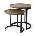 Set of Two Brown and Black Solid Wood and Iron Round Nested Tables on a white background