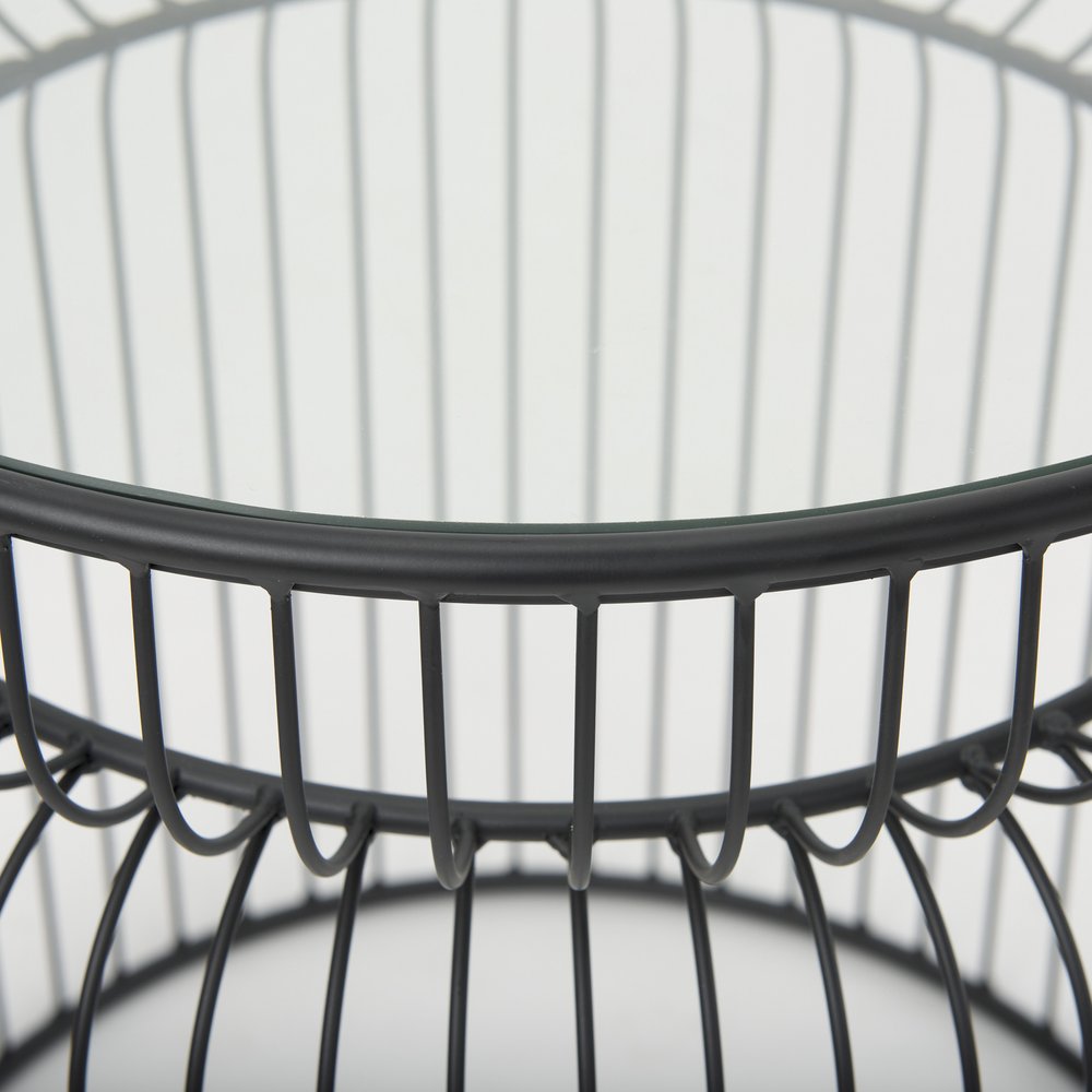 Set of Two Clear and Black Tempered Glass and Metal Wire Round Drum End Tables in a home interior