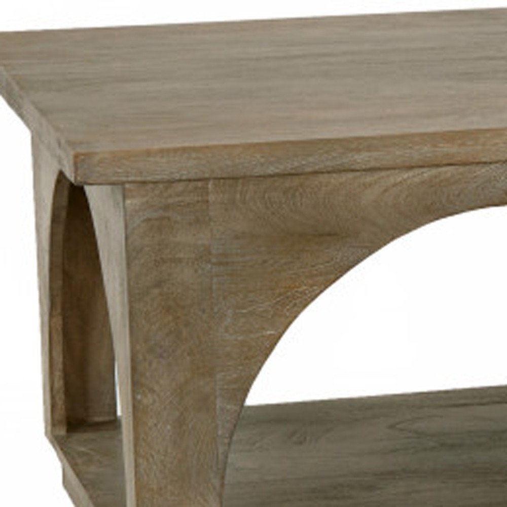 59" Brown Solid Wood Distressed Floor Shelf Coffee Table With Shelf. Coffee table in brown wood.