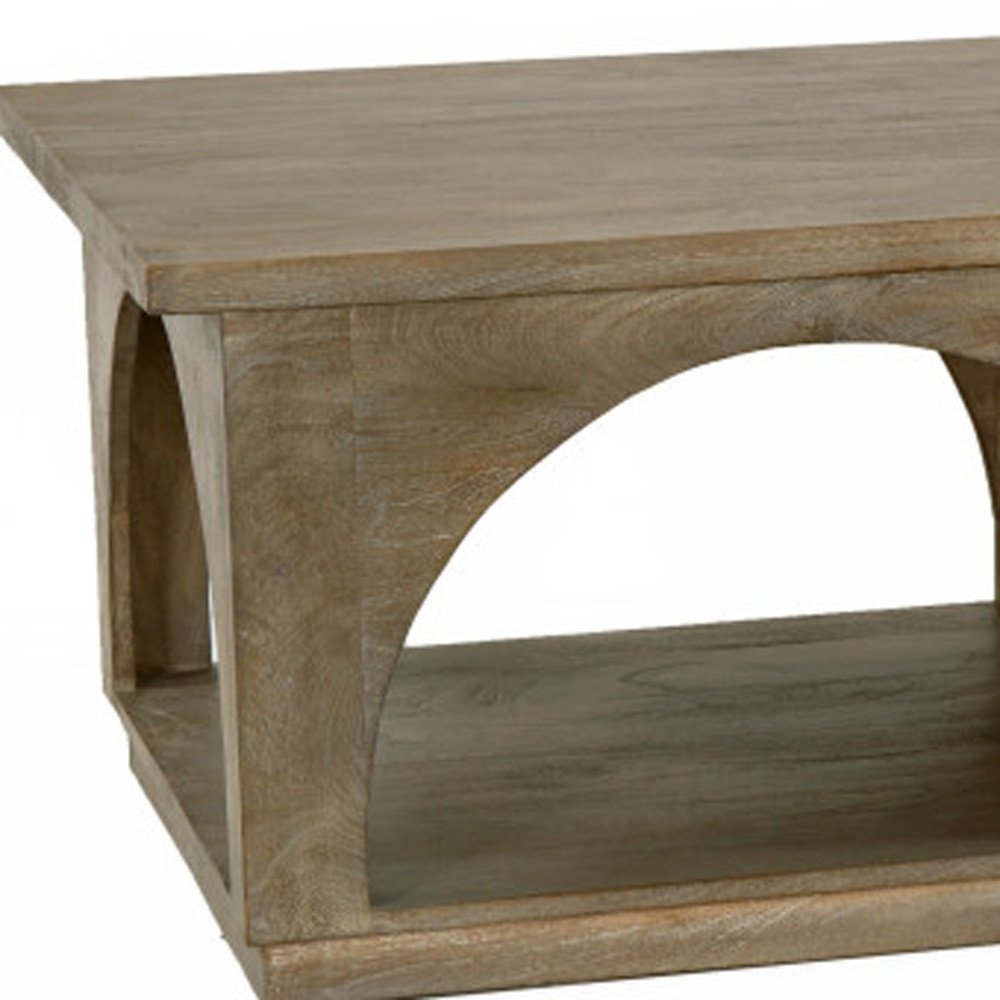 59" Brown Solid Wood Distressed Floor Shelf Coffee Table With Shelf. Coffee table isolated on a plain white background, finished in brown wood.