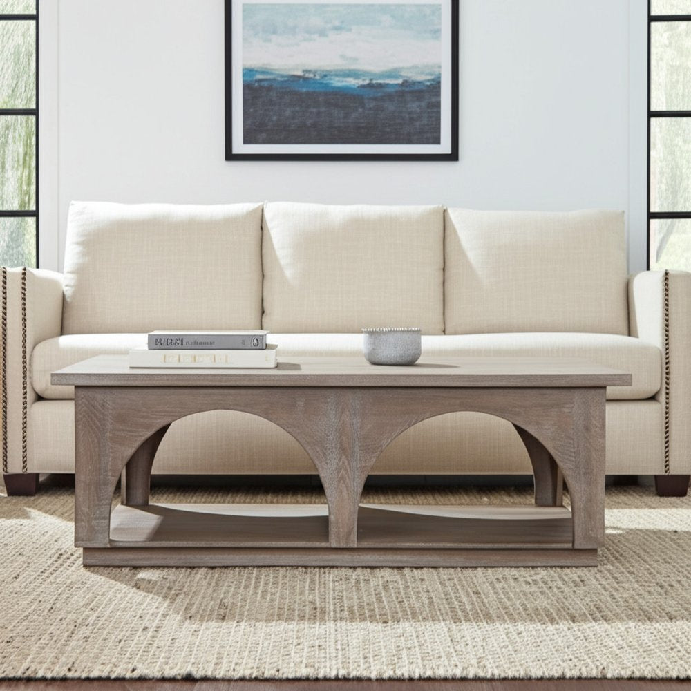 59" Brown Solid Wood Distressed Floor Shelf Coffee Table With Shelf shown outdoors on a tiled patio.