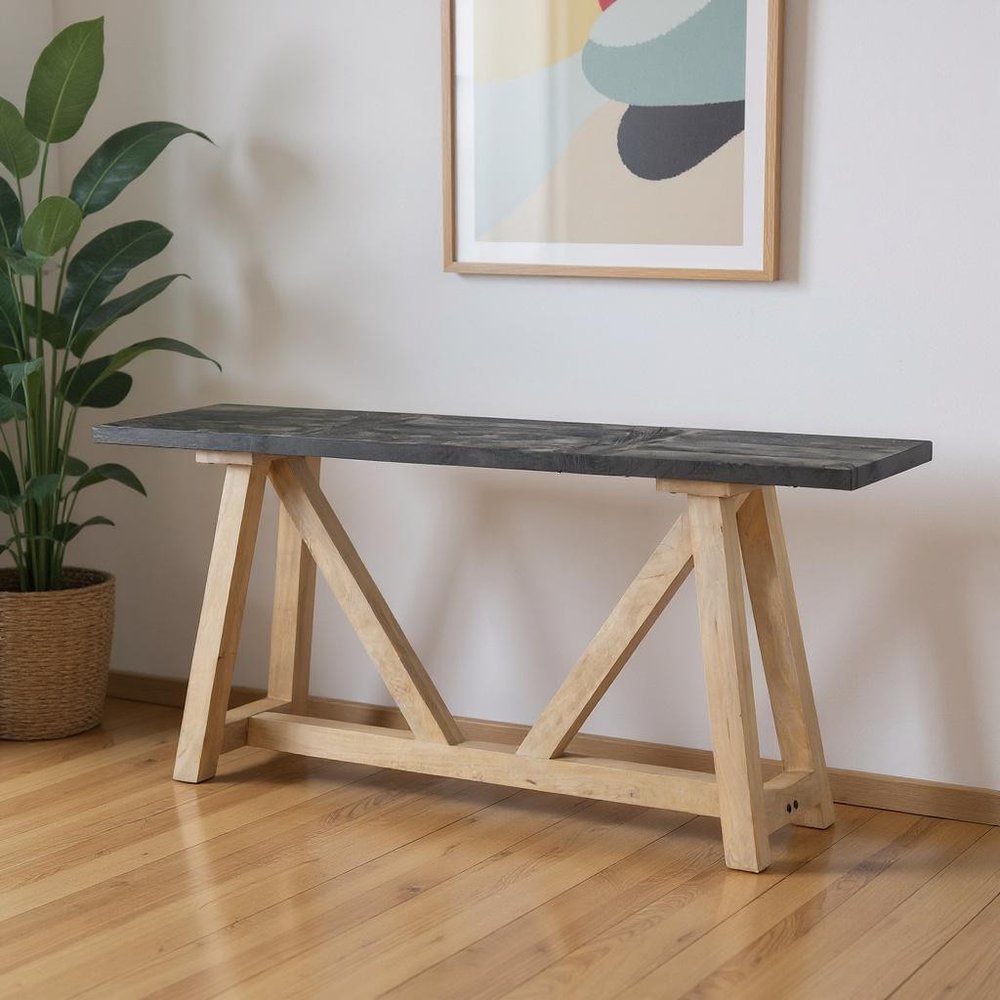 70" Black and Brown Solid Wood Trestle Console Table in a home interior