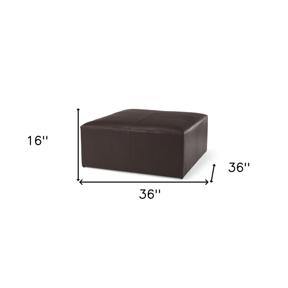 36" Brown Genuine Leather Cocktail Ottoman. Ottoman isolated on a plain white background, showing a leather surface.