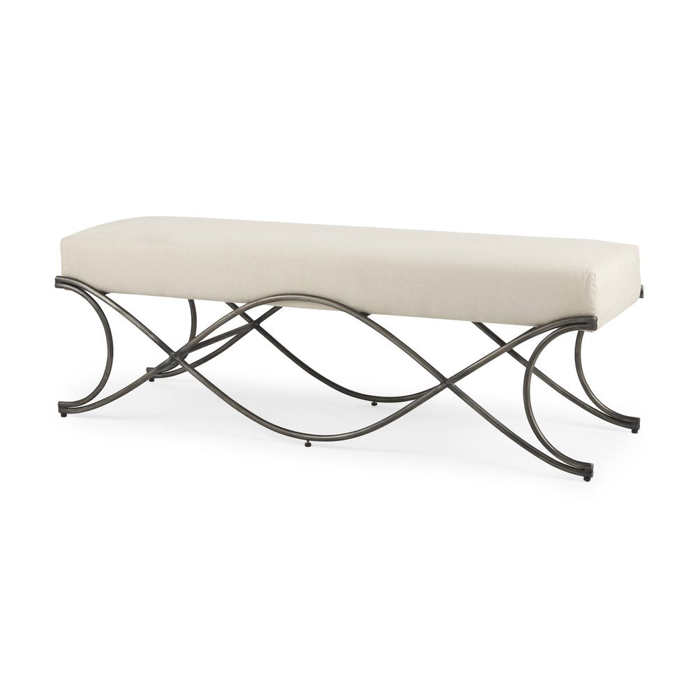 Cream upholstered bench with a decorative nickel metal base on a white background.