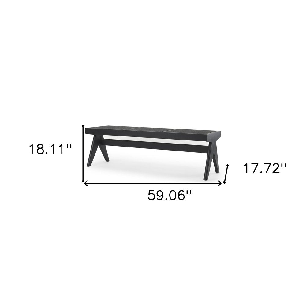 59" Black Solid Wood and Cane Dining Bench. Bench isolated on a plain white background, showing a black wood surface.