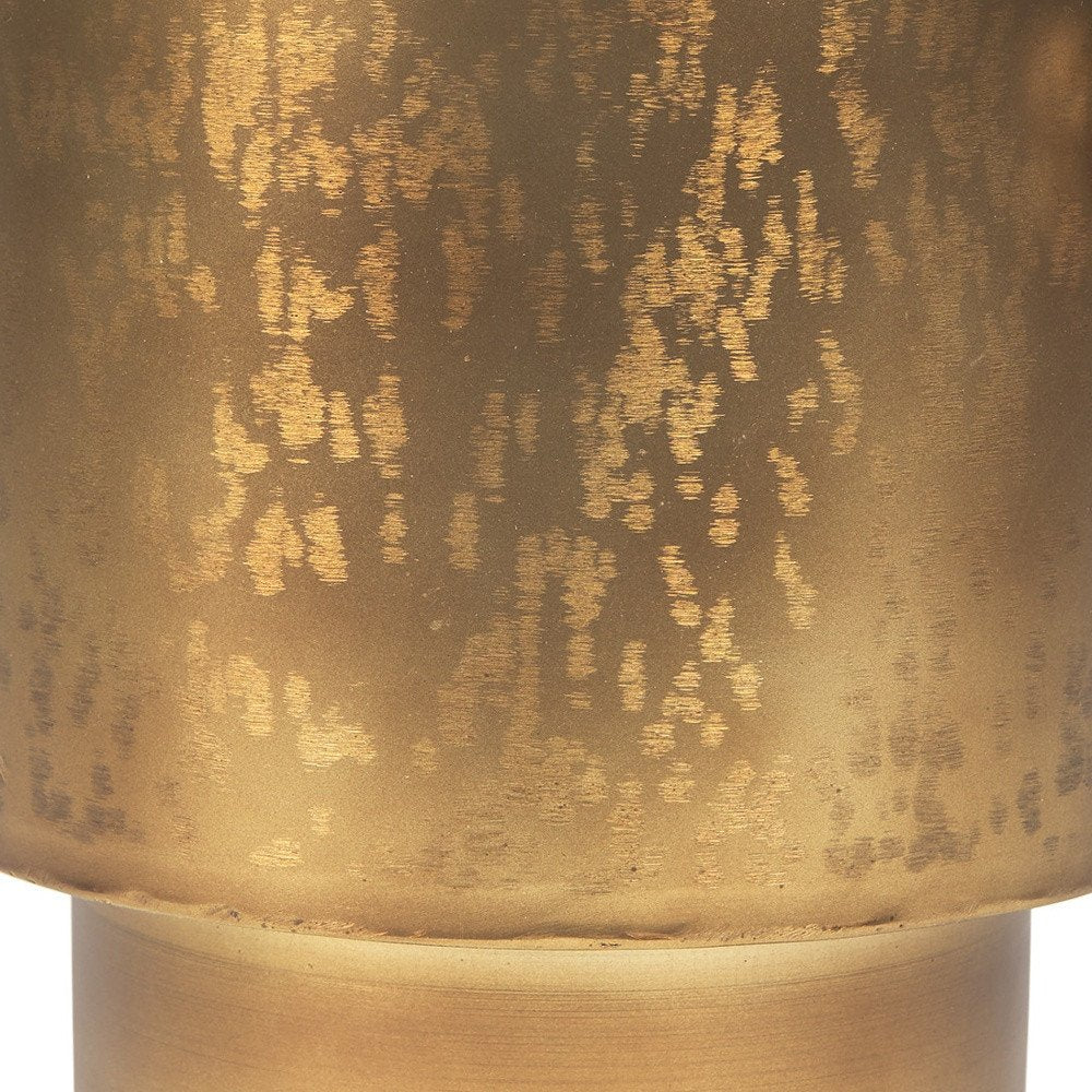 9" Gold Cast Iron Round Table Vase in a home interior