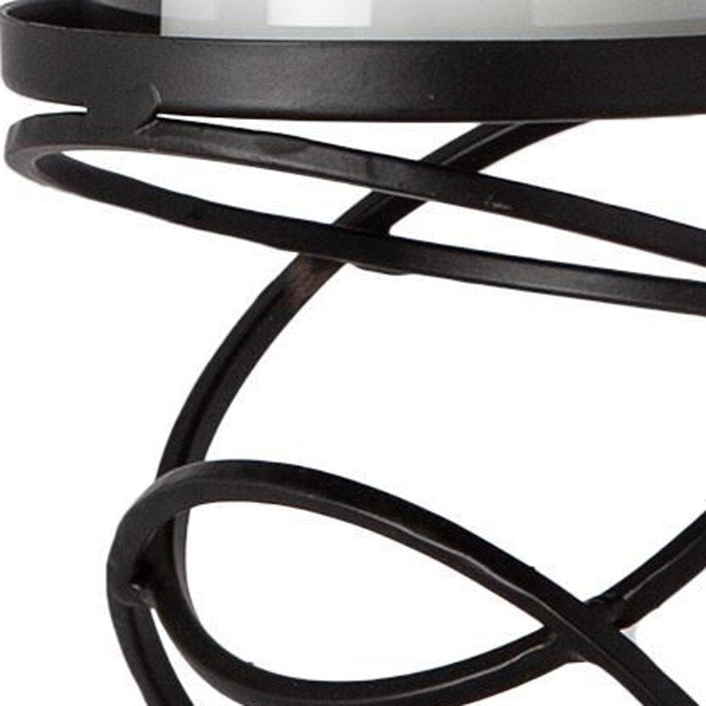 14" Black Geometric Glass And Metal Tabletop Pillar Candle Holder. Candle holder in black glass.