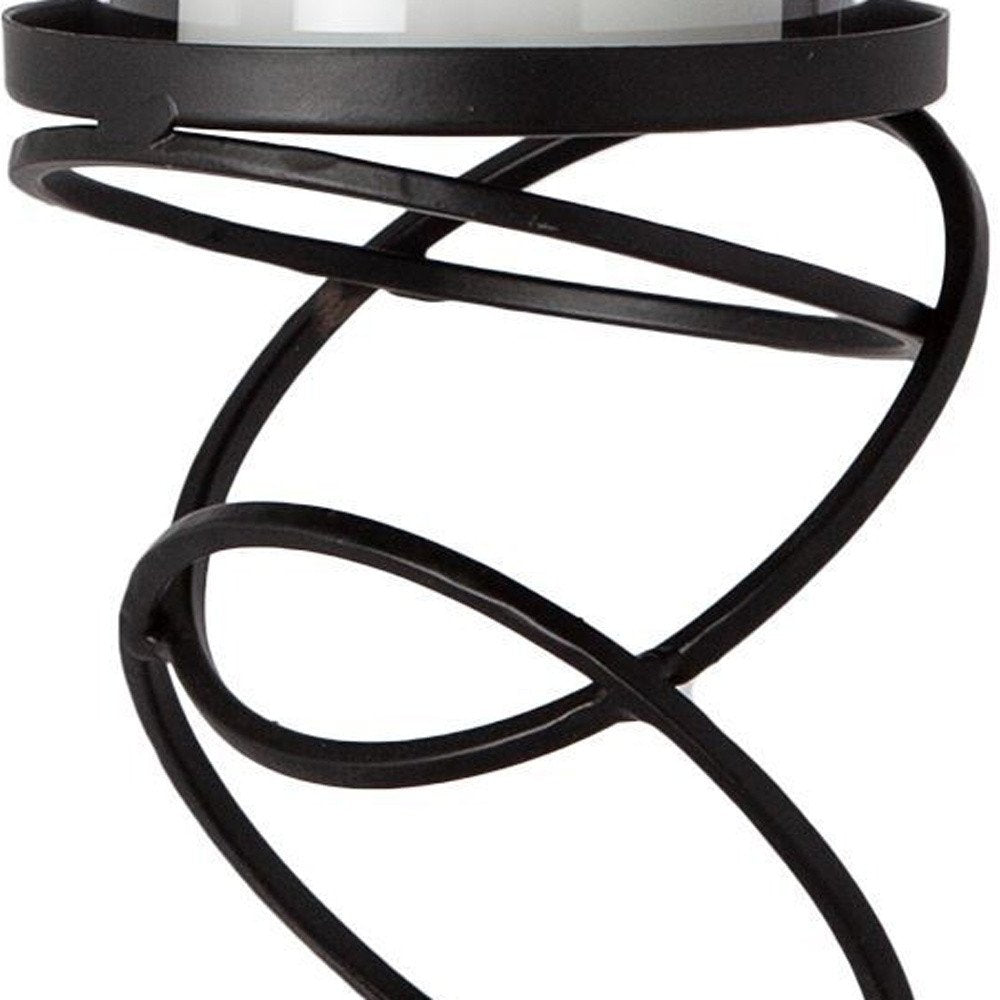 14" Black Geometric Glass And Metal Tabletop Pillar Candle Holder. Candle holder isolated on a plain white background, showing a black glass surface.