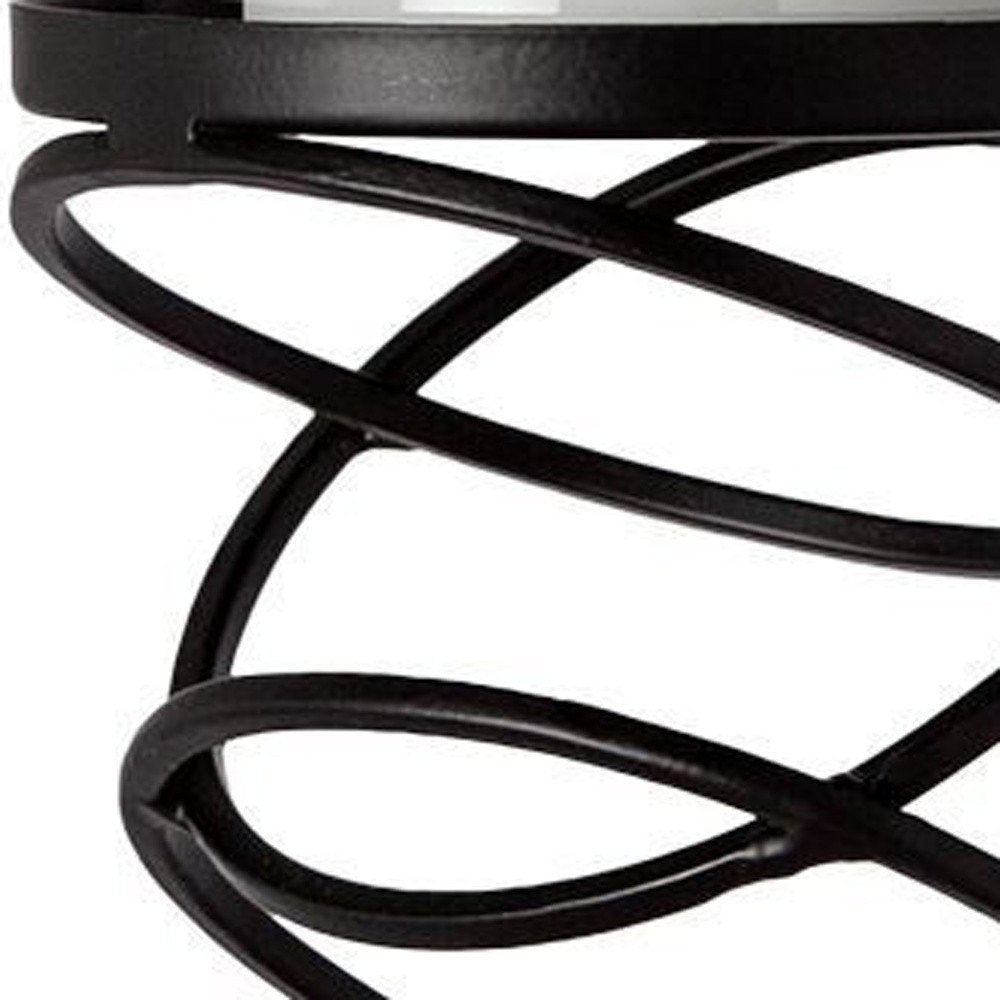 17" Black Geometric Glass And Metal Tabletop Pillar Candle Holder. Candle holder isolated on a plain white background, finished in black glass.