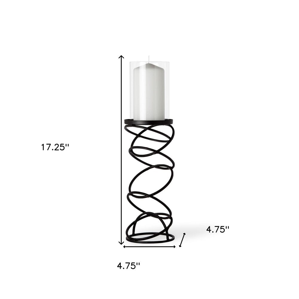 17" Black Geometric Glass And Metal Tabletop Pillar Candle Holder. Candle holder isolated on a plain white background, in a black glass finish.