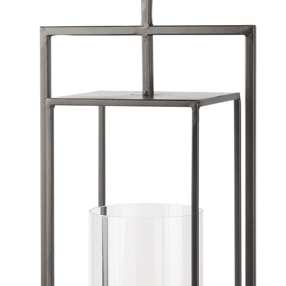 24" Black Geometric Metal Tabletop Lantern Candle Holder. Candle holder isolated on a plain white background, in a black metal finish.