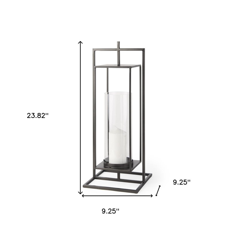 24" Black Geometric Metal Tabletop Lantern Candle Holder. Candle holder isolated on a plain white background, showing a metal surface.